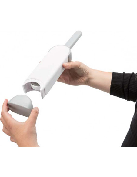 Kläd och textilborste med rensstation