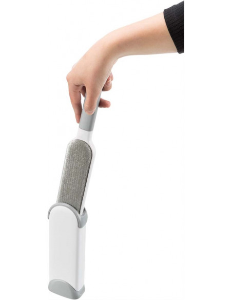 Kläd och textilborste med rensstation